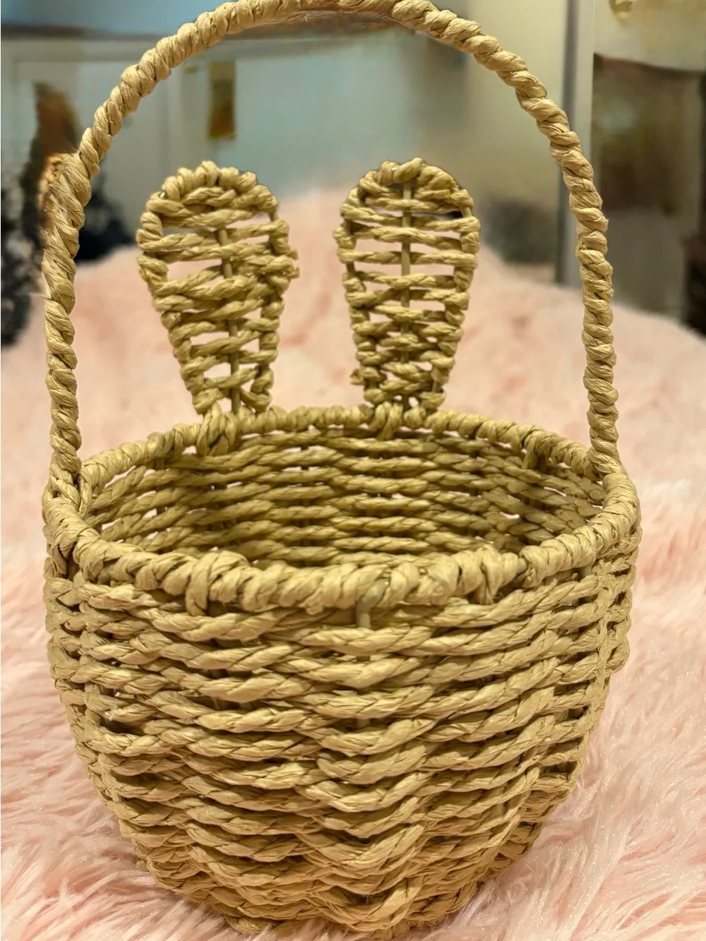 Homemade woven wicker and rattan bunny ear baskets.